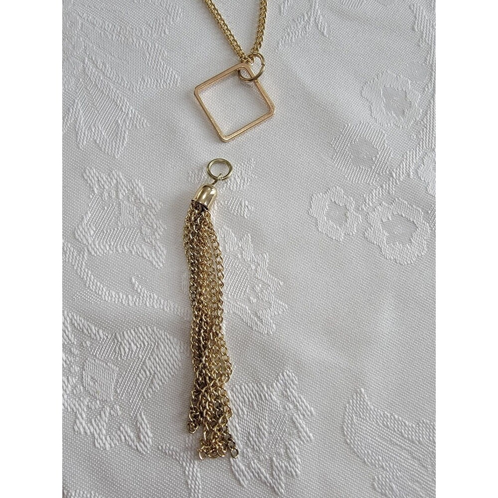 Gold Colored Necklace with Diamond Shaped Pendant and Tassel